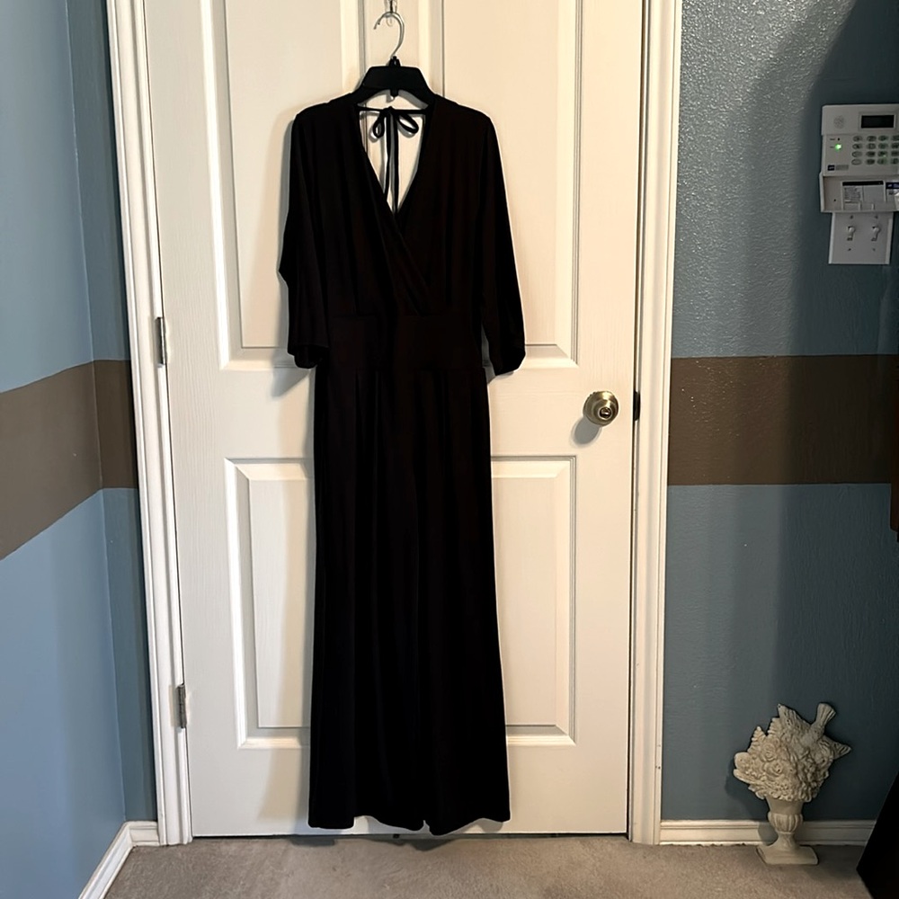 Thanth V neck jumpsuit. Knit, black, back string tie, size M. Worn once.
